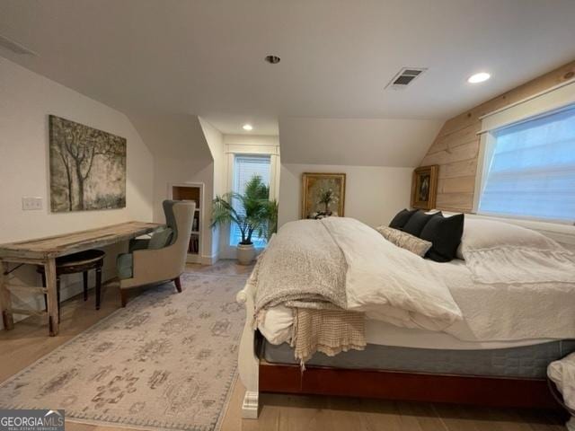 185 A W Roberts Dr, Ball Ground, GA 30107 - bedroom featuring multiple windows, lofted ceiling, and recessed lighting