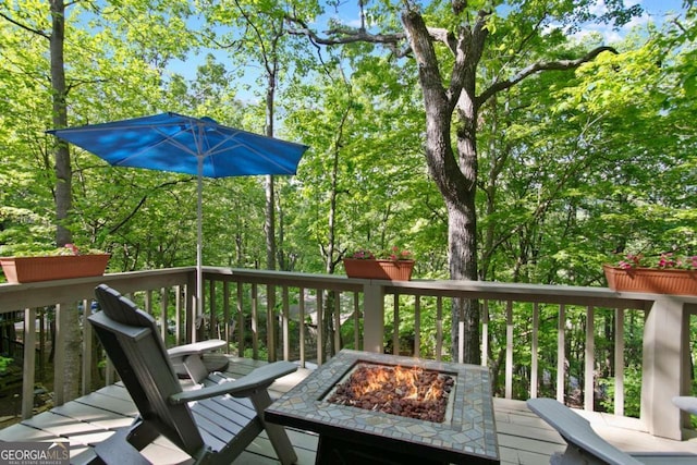 200 Villa Rd Unit 128, Jasper, GA 30143 - wooden terrace featuring an outdoor fire pit