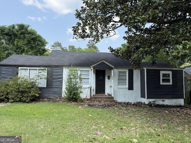 1057 Clay Ave, Macon, GA 31211 - ranch-style home with a front yard and crawl space
