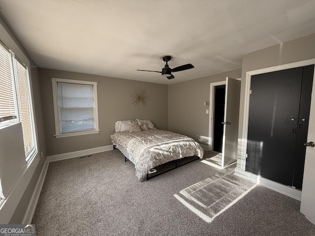 1057 Clay Ave, Macon, GA 31211 - carpeted bedroom featuring baseboards and a ceiling fan