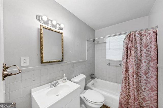844 Oak St NW, Atlanta, GA 30318 - full bathroom featuring toilet, vanity, tile walls, and shower / tub combo