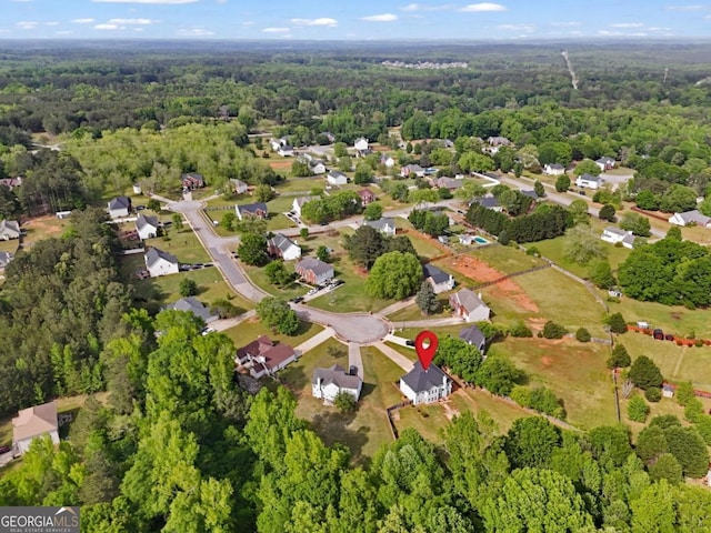 drone / aerial view with a forest view