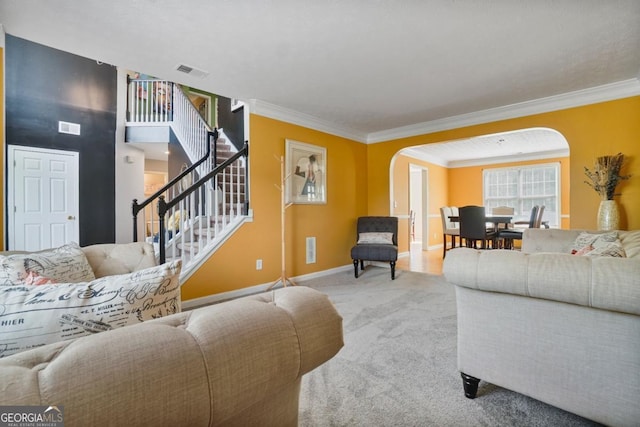 1314 Durham Ter, Mcdonough, GA 30252 - carpeted living area featuring arched walkways, ornamental molding, and stairs