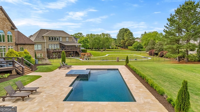 770 Tralee Dr, Fayetteville, GA 30215 - view of pool with a pool with connected hot tub, a patio, a fenced backyard, a wooden deck, and a lawn