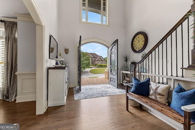 770 Tralee Dr, Fayetteville, GA 30215 - foyer entrance featuring wood finished floors, a high ceiling, and stairs