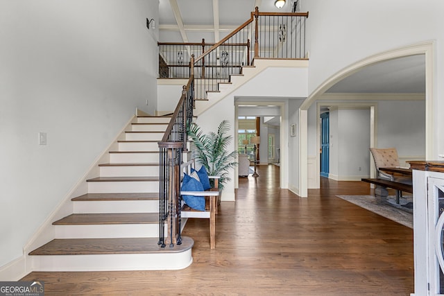 770 Tralee Dr, Fayetteville, GA 30215 - foyer entrance featuring stairway, a high ceiling, baseboards, and wood finished floors
