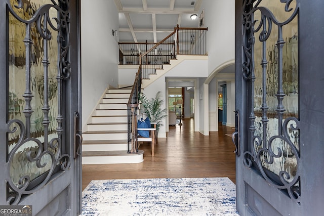 770 Tralee Dr, Fayetteville, GA 30215 - foyer entrance with stairs, baseboards, a towering ceiling, and wood finished floors