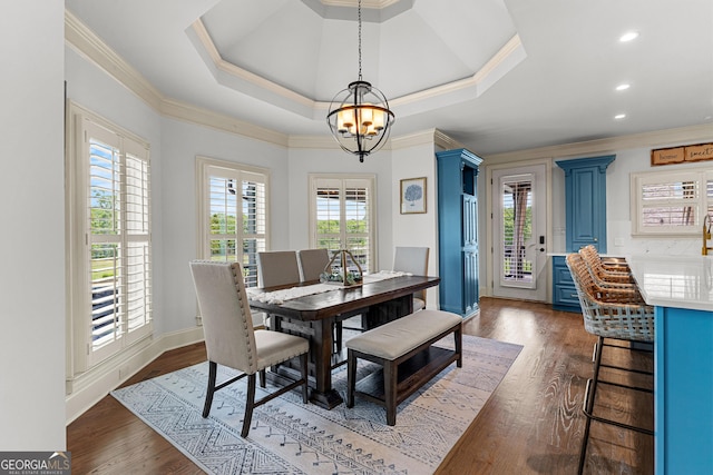 770 Tralee Dr, Fayetteville, GA 30215 - dining room featuring a chandelier, ornamental molding, and dark wood-style flooring