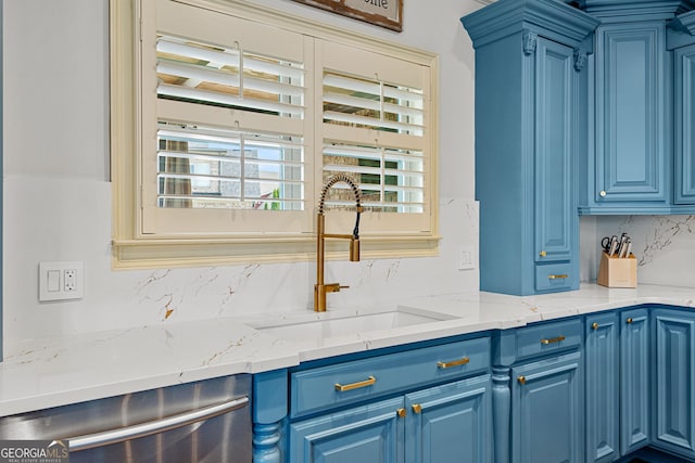 770 Tralee Dr, Fayetteville, GA 30215 - kitchen with a sink, blue cabinets, stainless steel dishwasher, and decorative backsplash