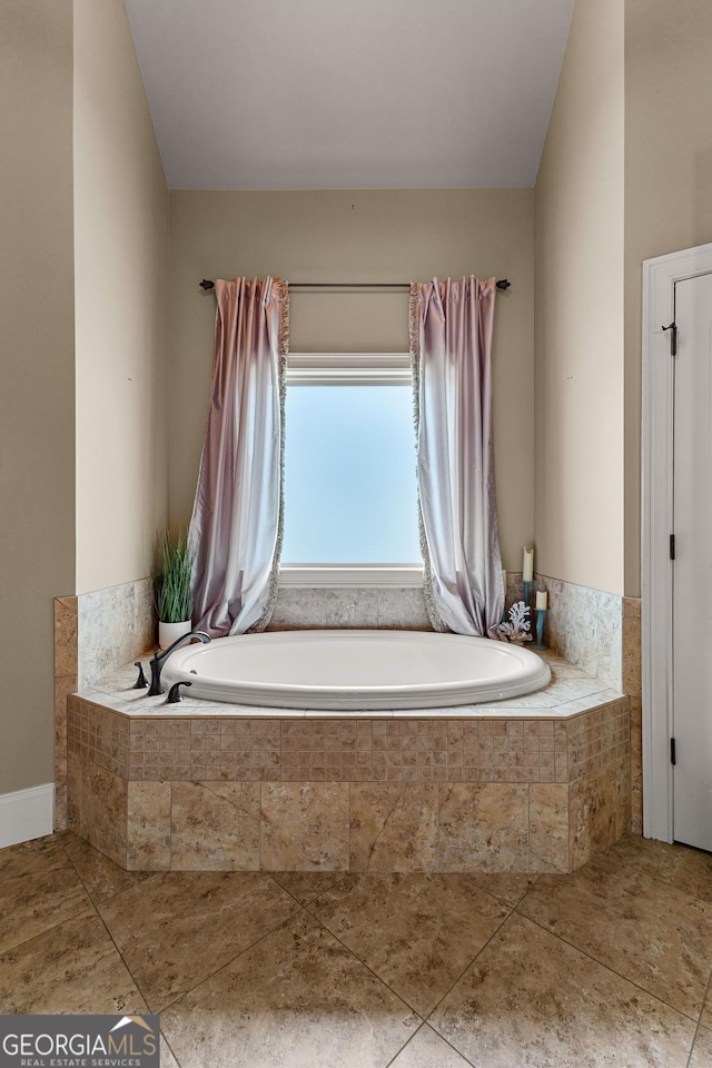 770 Tralee Dr, Fayetteville, GA 30215 - full bathroom with a garden tub and tile patterned flooring