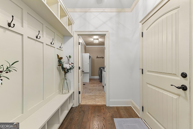 770 Tralee Dr, Fayetteville, GA 30215 - mudroom featuring crown molding, baseboards, and dark wood-type flooring