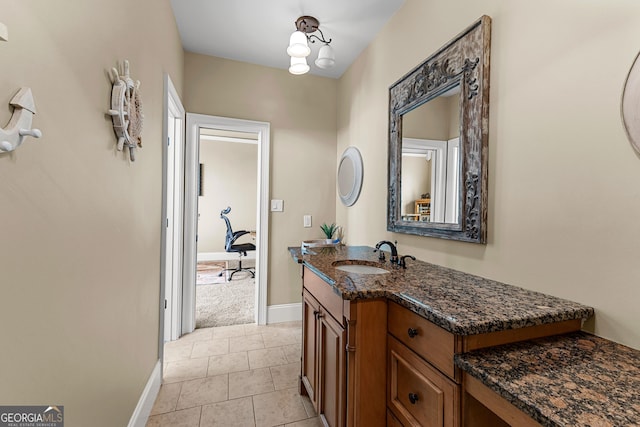 770 Tralee Dr, Fayetteville, GA 30215 - bathroom featuring baseboards, tile patterned flooring, and vanity