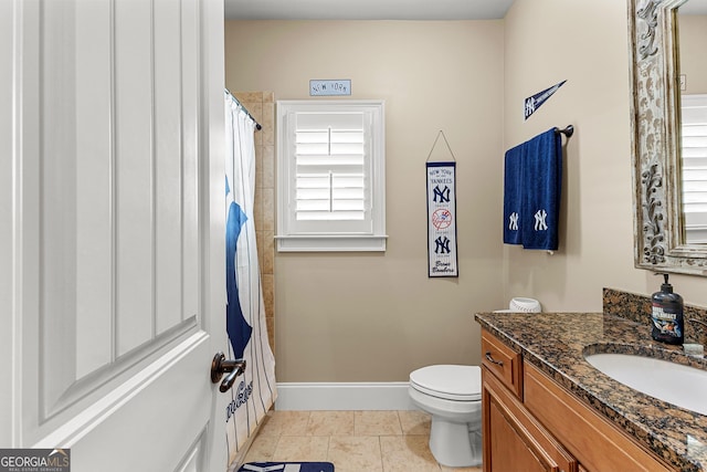 770 Tralee Dr, Fayetteville, GA 30215 - bathroom with vanity, toilet, a shower with curtain, and baseboards
