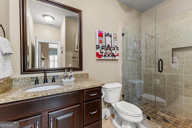 770 Tralee Dr, Fayetteville, GA 30215 - full bath featuring vanity, toilet, a shower stall, and visible vents