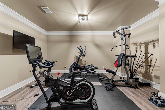 770 Tralee Dr, Fayetteville, GA 30215 - workout area with baseboards, visible vents, crown molding, and wood finished floors