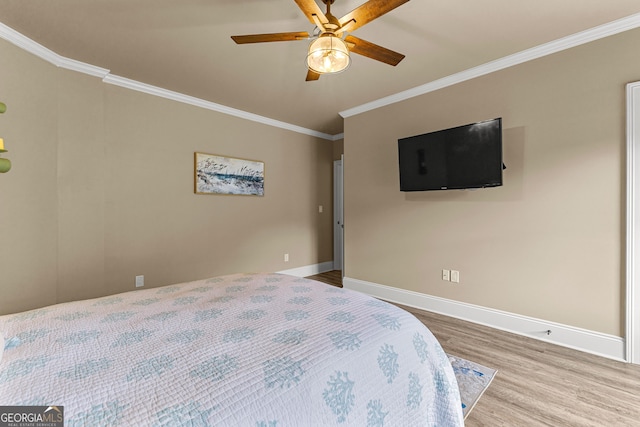 770 Tralee Dr, Fayetteville, GA 30215 - bedroom featuring ornamental molding, baseboards, a ceiling fan, and wood finished floors