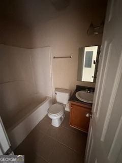 full bathroom with vanity, toilet, and tile patterned flooring