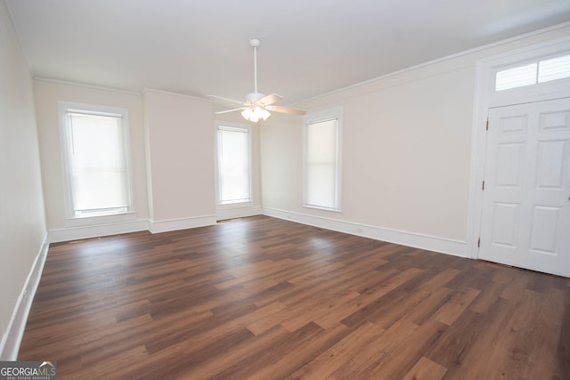 31 Saint Clair St, Newnan, GA 30263 - entrance foyer featuring dark wood-style flooring, ornamental molding, baseboards, and a ceiling fan