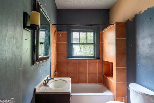 1388 Metropolitan Ave SE, Atlanta, GA 30316 - bathroom with a bath, toilet, vanity, and a textured ceiling
