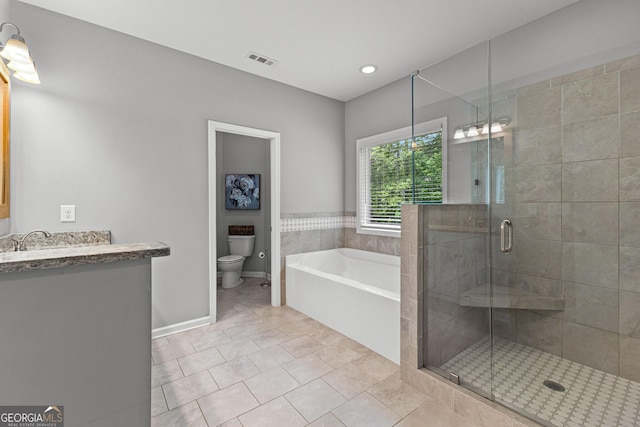 88 Carl Williams Rd, Senoia, GA 30276 - bathroom with toilet, a stall shower, vanity, a bath, and tile patterned floors