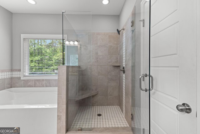 88 Carl Williams Rd, Senoia, GA 30276 - bathroom featuring a stall shower, a bath, and recessed lighting