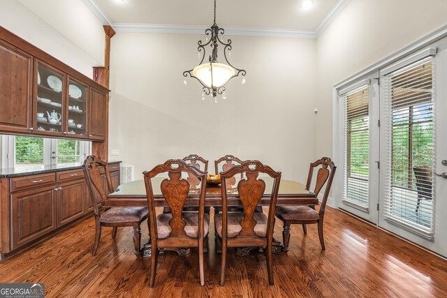 350 Greystone Dr, Milledgeville, GA 31061 - dining room with dark wood-style flooring and crown molding