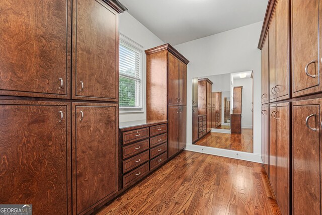 350 Greystone Dr, Milledgeville, GA 31061 - walk in closet with dark wood finished floors