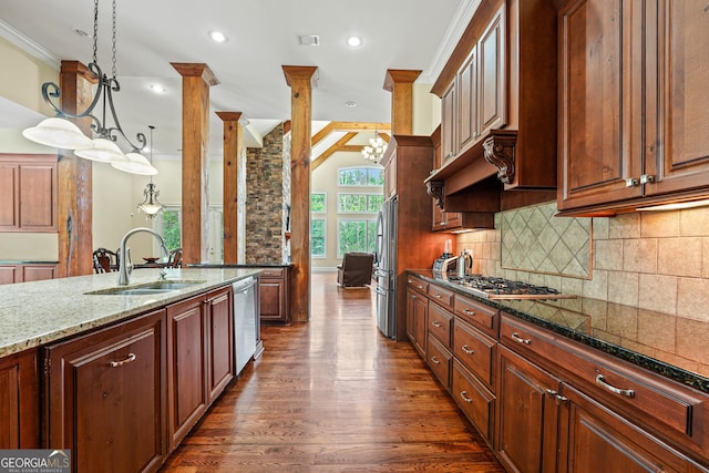 350 Greystone Dr, Milledgeville, GA 31061 - kitchen featuring a sink, tasteful backsplash, light stone counters, dark wood finished floors, and appliances with stainless steel finishes