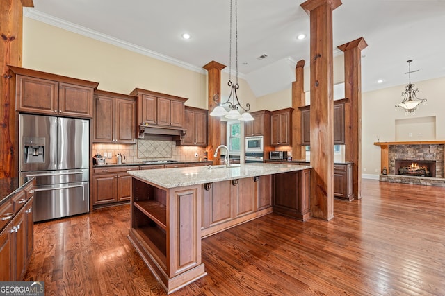 350 Greystone Dr, Milledgeville, GA 31061 - kitchen with stainless steel appliances, tasteful backsplash, light stone counters, dark wood-type flooring, and crown molding