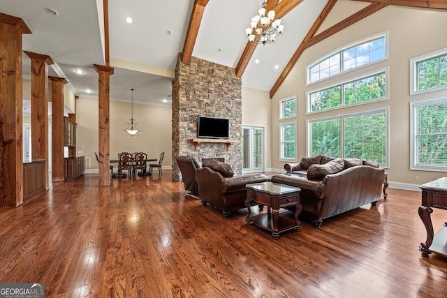 350 Greystone Dr, Milledgeville, GA 31061 - living area with beam ceiling, dark wood-type flooring, a healthy amount of sunlight, and high vaulted ceiling