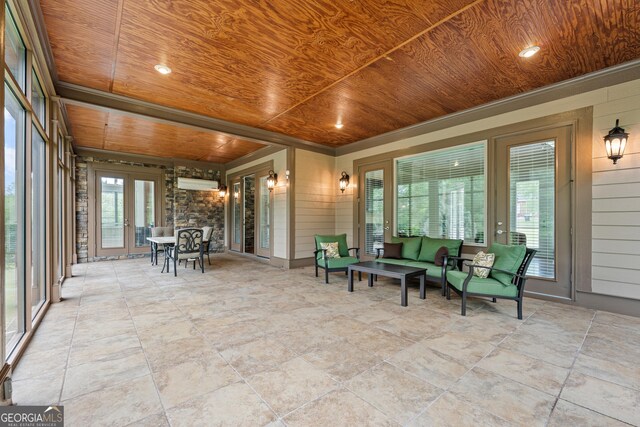 350 Greystone Dr, Milledgeville, GA 31061 - sunroom / solarium with a wall mounted air conditioner, french doors, outdoor lounge area, wooden ceiling, and wooden walls