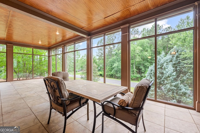 350 Greystone Dr, Milledgeville, GA 31061 - sunroom featuring wooden ceiling, tile patterned flooring, and outdoor dining space