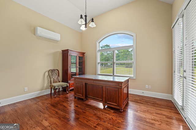 350 Greystone Dr, Milledgeville, GA 31061 - office area with a notable chandelier, a wall mounted air conditioner, baseboards, vaulted ceiling, and dark wood-style floors
