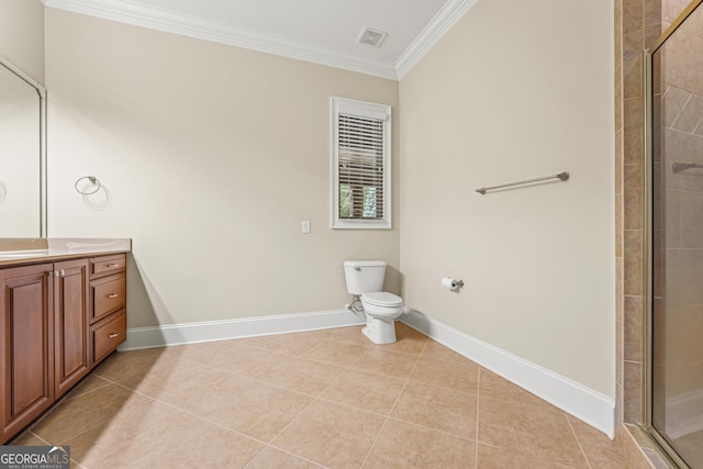 350 Greystone Dr, Milledgeville, GA 31061 - full bathroom featuring toilet, a tile shower, tile patterned floors, crown molding, and baseboards