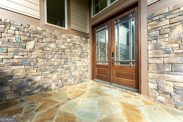 350 Greystone Dr, Milledgeville, GA 31061 - doorway to property with french doors and stone siding