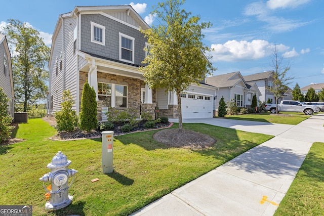 craftsman house with driveway, a garage, central air condition unit, stone siding, and a front lawn