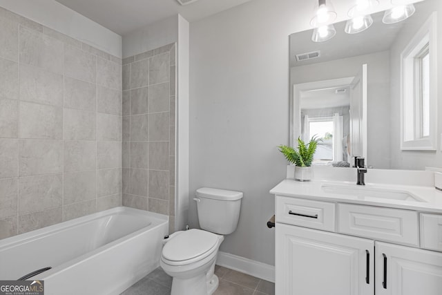 bathroom with toilet, baseboards, visible vents, tile patterned floors, and vanity