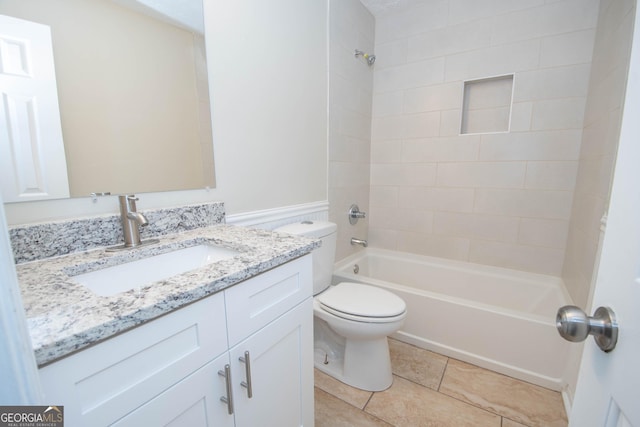 bathroom featuring vanity, toilet, tub / shower combination, and tile patterned flooring