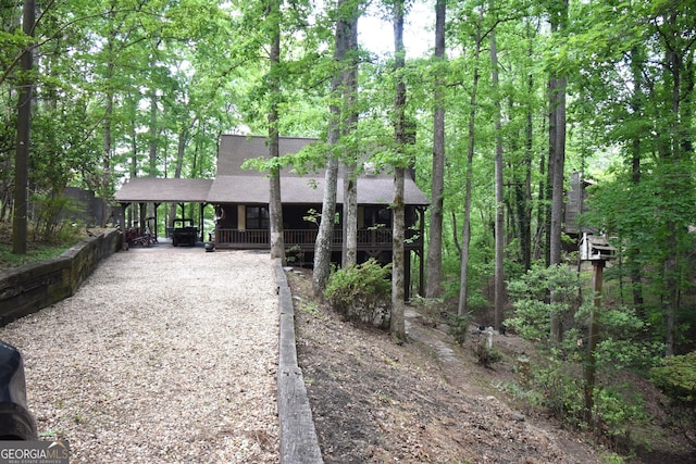 4056 Ryckeley Dr, Gainesville, GA 30504 - view of front facade with a shingled roof and driveway