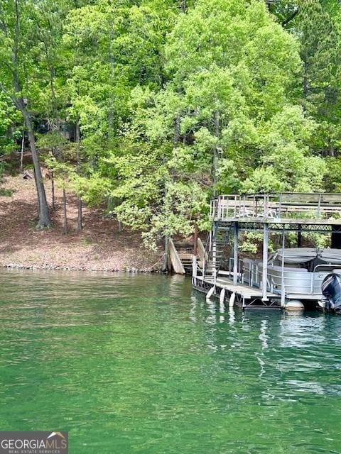 4056 Ryckeley Dr, Gainesville, GA 30504 - view of dock with a wooded view and a water view