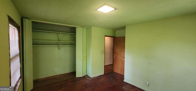 unfurnished bedroom with a closet