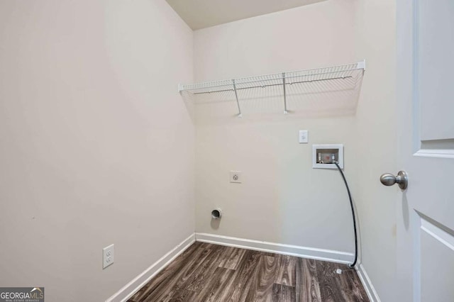 laundry room with baseboards, hookup for a washing machine, dark wood finished floors, laundry area, and electric dryer hookup