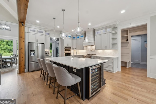 852 Tom Miller Rd, Bethlehem, GA 30620 - kitchen with light wood-style flooring, open shelves, appliances with stainless steel finishes, premium range hood, and wine cooler