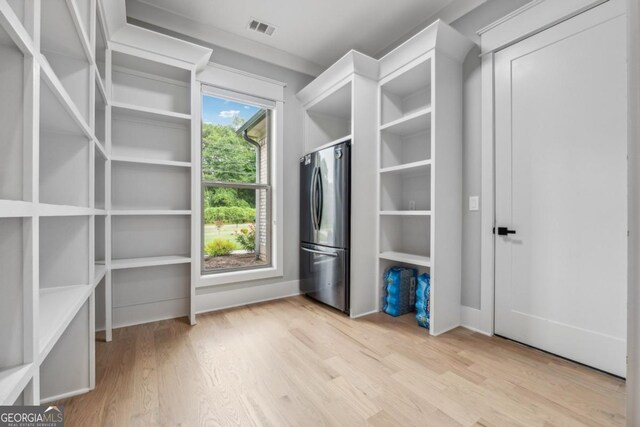 852 Tom Miller Rd, Bethlehem, GA 30620 - walk in closet with light wood finished floors and visible vents