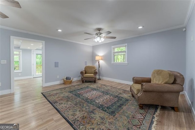 sitting room with recessed lighting, ceiling fan, and plenty of natural light