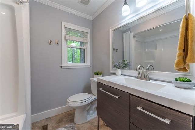 bathroom featuring toilet, ornamental molding, visible vents, and baseboards