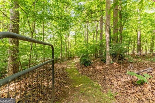 exterior space with a forest view