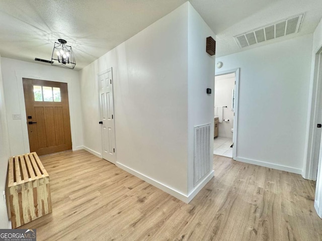 801 W Grossman Dr, Vidalia, GA 30474 - foyer with light wood finished floors and baseboards