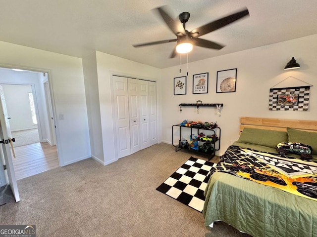 801 W Grossman Dr, Vidalia, GA 30474 - carpeted bedroom featuring a closet, ceiling fan, and baseboards