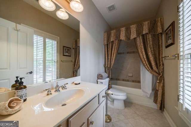 3127 Lenox Rd NE Unit 1, Atlanta, GA 30324 - full bathroom featuring toilet, visible vents, shower / bath combination with curtain, tile patterned flooring, and vanity